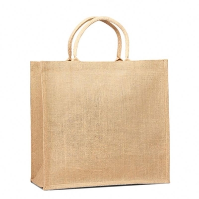 Les femmes échouent le milieu ont manipulé le sac à provisions de jute de 50cm