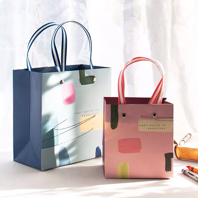 Les sacs 40g non tissés de Noël CMYK 32x11x25cm sont écologiques